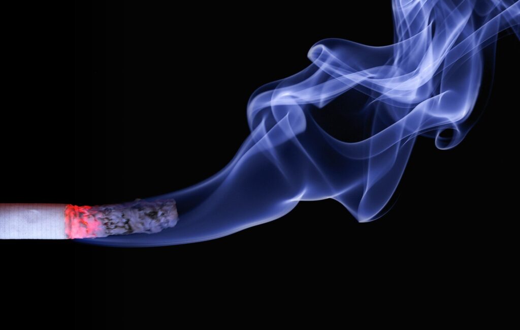 Photo of blue flame on cigarette butt